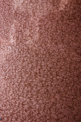 brown or bronze hammered metal background,abstract metalic texture, sheet of metal surface painted with hammer paint