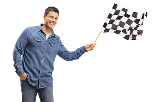 Young handsome man holding a checkered flag