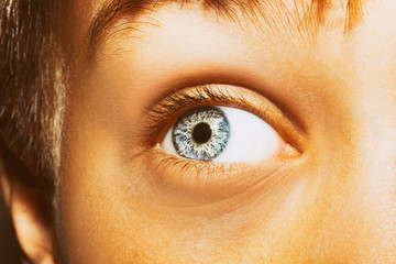 A beautiful insightful look boy's eye. Close up shot.