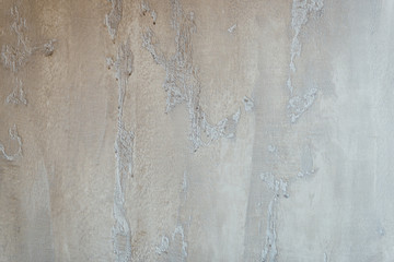 texture of the wall with gray handmade plaster