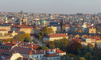 Fototapeta na wymiar Prague - The panorama of the city with the Charles bridge on Olt Town in evening light.