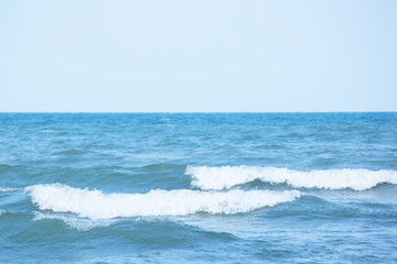 Naklejka na ściany i meble Sea Waves in ocean wave Splashing Ripple Water. Blue water background. 