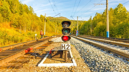 Railway traffic light. Red light.