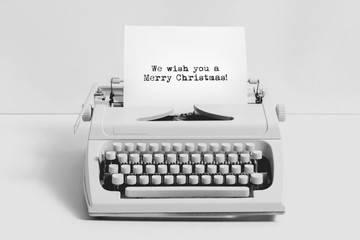 Christmas wishes written on an old typewriter.