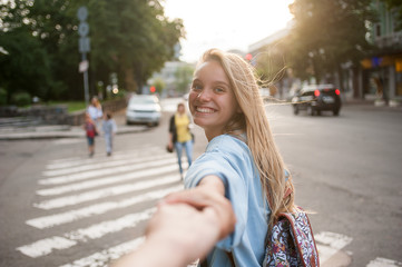 Fototapeta premium Young caucasian girl in love on a street