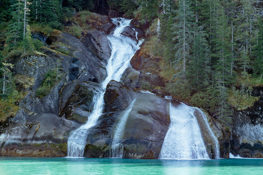 Waterfall in Tracy Arm fjord near Juneau Alaska
