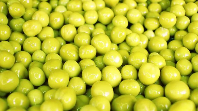 Green pea peas rotating texture pattern closeup footage