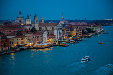 Fototapeta na wymiar Night view of Grand Canal with old houses in Venice in Italy