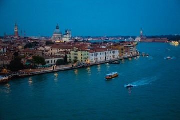 Fototapeta na wymiar Night view of Grand Canal with old houses in Venice in Italy