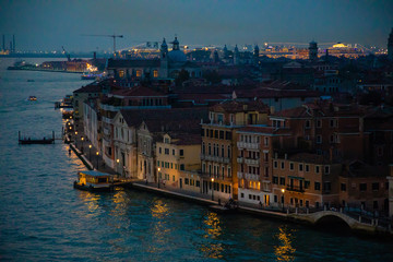 Fototapeta premium Night view of Grand Canal with old houses in Venice in Italy