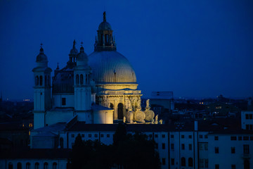 Night view of Grand Canal and basilica di santa maria della salute in Venice in Italy