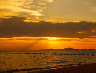 Fototapeta na wymiar Pattaya sunset on the beach. Thailand