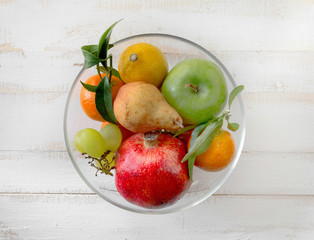 Top view of fresh fruits on white