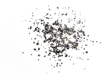 Scattered small black pebbles, isolated on white background