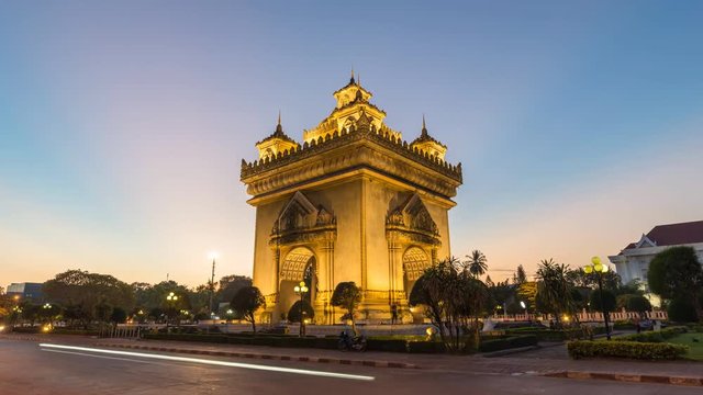 Vientiane Laos time lapse 4K, city skyline day to night sunset timelapse at Patuxai (Patuxay)