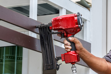 Pneumatic nails gun shooting