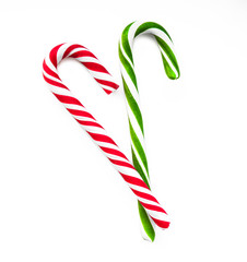 Сandy cane striped in Christmas colours isolated on a white background