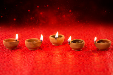 Happy Diwali Diya lamps lit during diwali celebration