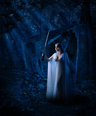 Elf girl in night forest