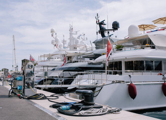 Yachts and ships in the port of Monaco in summer solar Europe