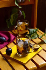 Cold green tea with plum, vertical