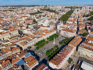 Fototapeta na wymiar The aerial view on Pedro IV Square with the same named Column and The National Theatre of Lisbon, Portugal.