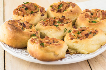 Homemade cheesy bacon holiday rolls.