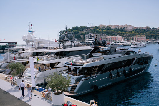 Yachts and ships in the port of Monaco in summer solar Europe