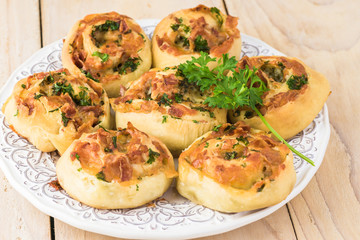 Homemade cheesy bacon holiday rolls.