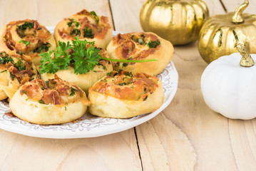Homemade cheesy bacon holiday rolls.