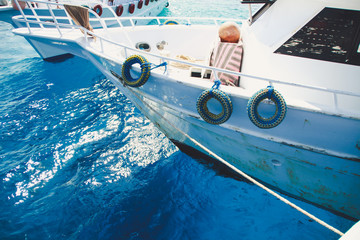 Beautiful white yacht in the middle of the sea. Red Sea, Sharm El Sheikh. Egypt. Journey on a boat.