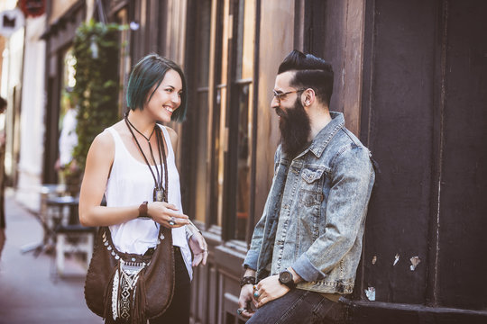 Young hipster couple in full discussion