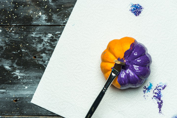 do it yourself, painting Halloween pumpkins in purple