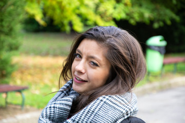 Fototapeta premium beautiful arabic girl winks to camera in Germany on the street