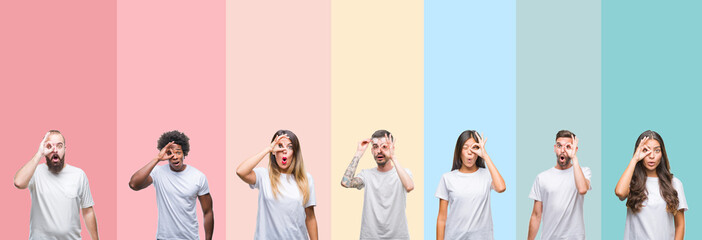 Collage of different ethnics young people wearing white t-shirt over colorful isolated background doing ok gesture shocked with surprised face, eye looking through fingers. Unbelieving expression.