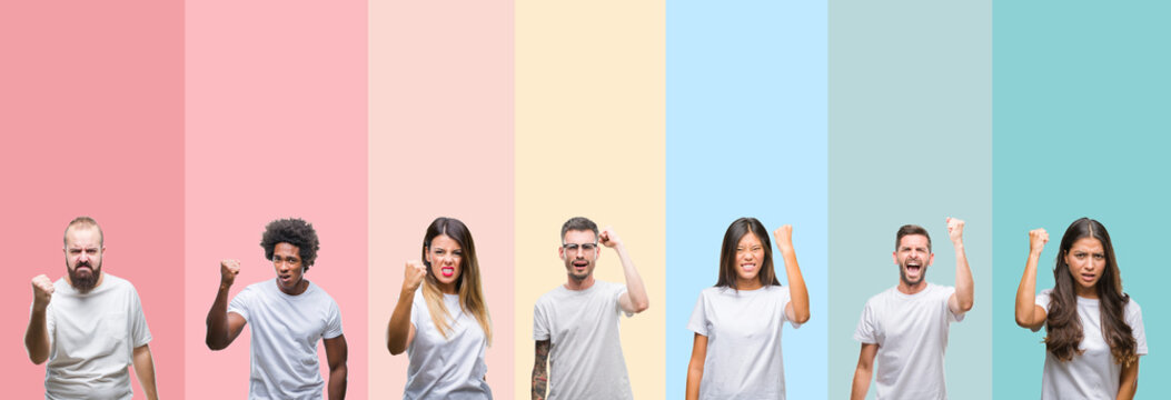 Collage of different ethnics young people wearing white t-shirt over colorful isolated background angry and mad raising fist frustrated and furious while shouting with anger. Rage and aggressive