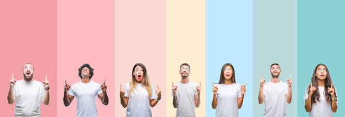Collage of different ethnics young people wearing white t-shirt over colorful isolated background amazed and surprised looking up and pointing with fingers and raised arms.