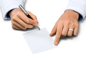 Close-up of Doctor Writing on a Prescriprion