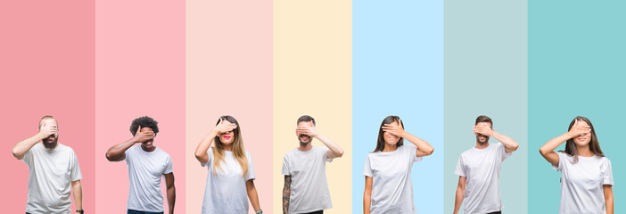 Collage of different ethnics young people wearing white t-shirt over colorful isolated background smiling and laughing with hand on face covering eyes for surprise. Blind concept.