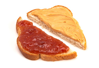 A Classic Peanut Butter and Strawberry Jelly Sandwich on Wheat Bread