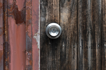 metal handle on a old wooden door