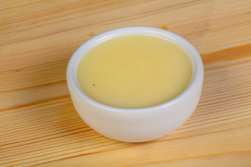 Condensed milk in the bowl