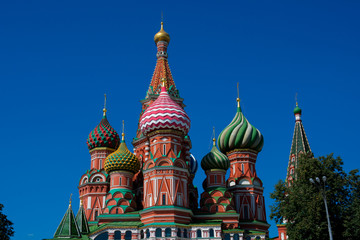 Fototapeta na wymiar Saint Basil's Cathedral (Sobor Vasiliya Blazhennogo) is a church in Red Square. Onion Domes. Moscow, Russia