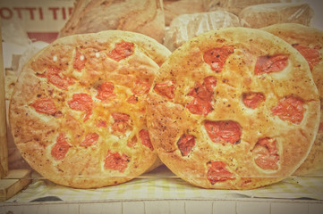 Traditional italian focaccia with cherry tomatoes
