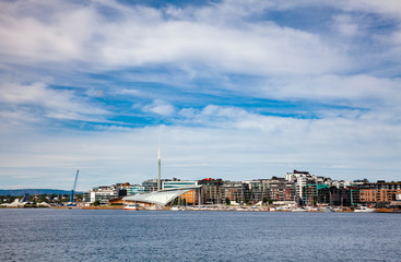 Naklejka premium Pipervika harbour with Aker Brygge neighbourhood Central Oslo Norway Scandinavia