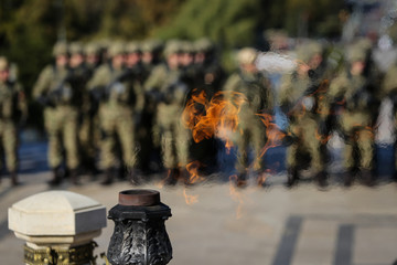 Eternal flame for the heroes at the monument in the memory of fallen soldiers