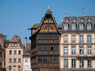 Fototapeta na wymiar Row of old historical houses in Strasbourg, France, on a warm day in summer