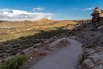 Switchback trail in Arches National Park, along the delicate arch trail in early morning sunshine