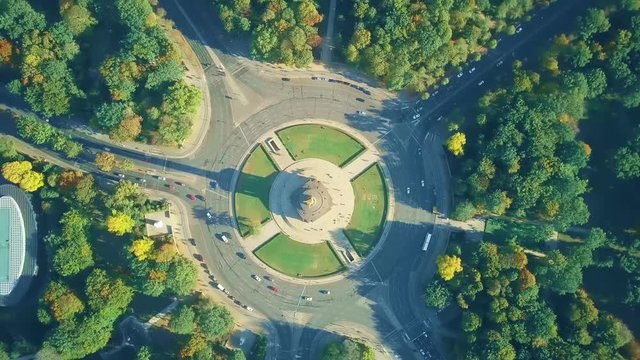 Aerial top down hyperlapse of Berlin Victory Column roundabout traffic