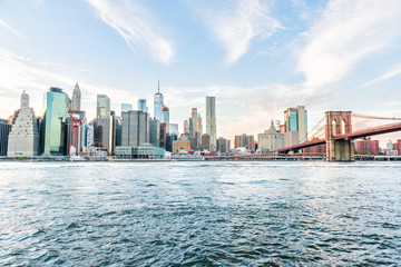 Outdoors view on NYC New York City Brooklyn Bridge Park by east river, cityscape skyline at day...